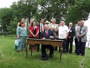  Gov Doyle Signing State-Tribal Consultation Policies 